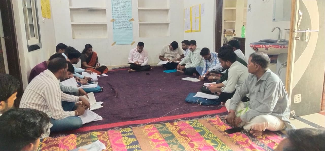 Daang Vikas Sansthan employees presenting reports at the review meeting